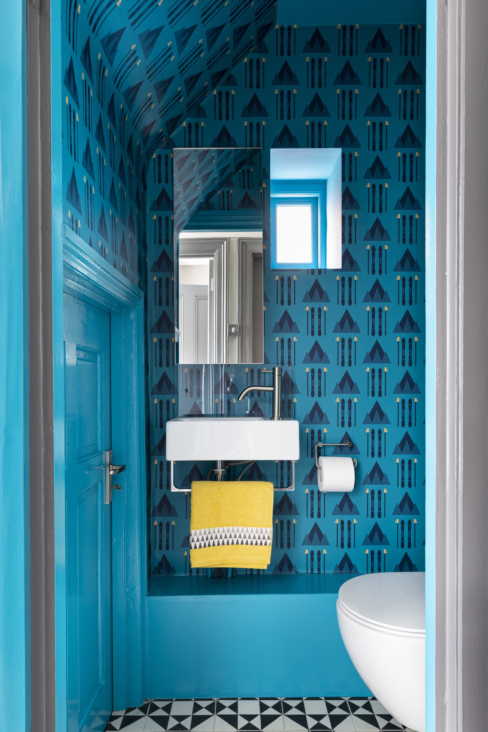 Bespoke cloakroom in home design by interior designer Emma Green