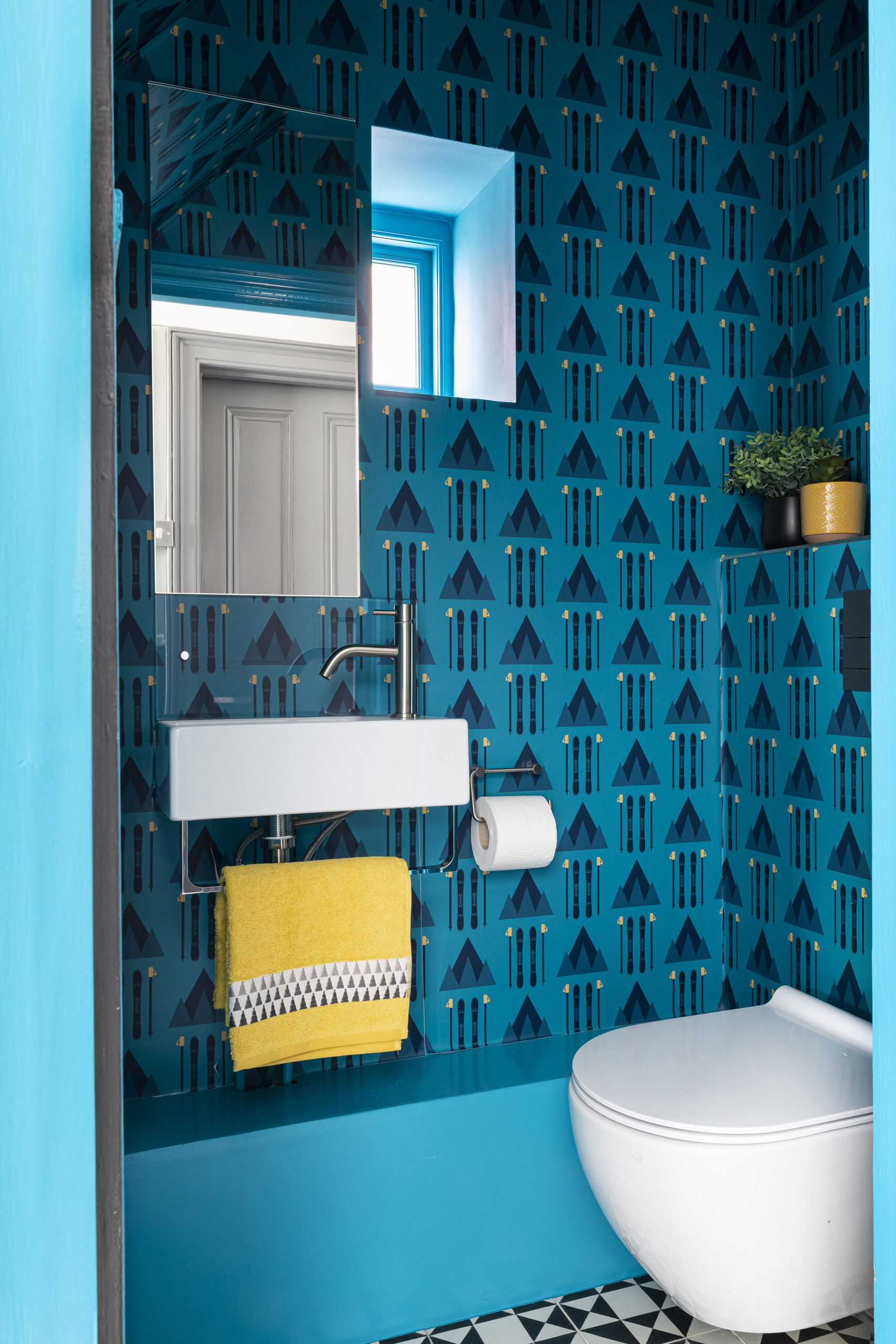 Funky bespoke cloakroom design in London by Emma Green