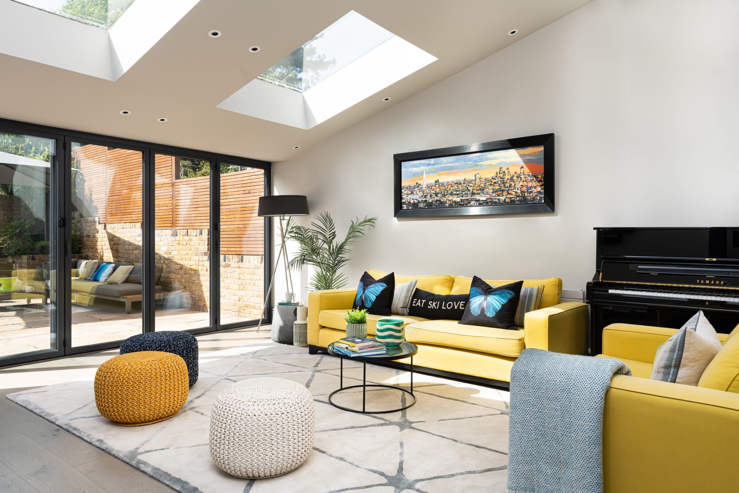 Living area with views onto the garden in Wimbledon Village home design