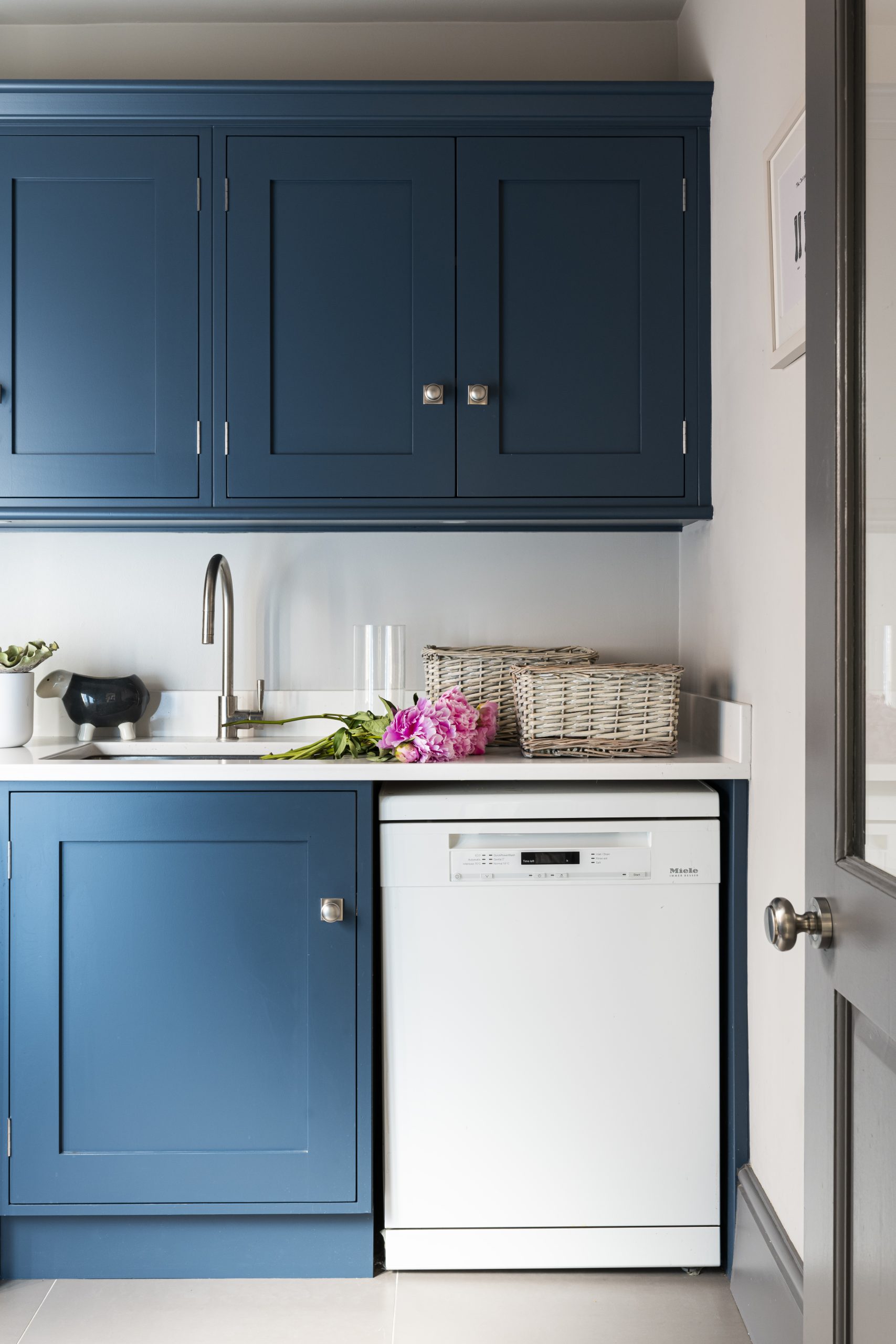 Bespoke utility room designed by Emma Green in home design in Wimbledon Village