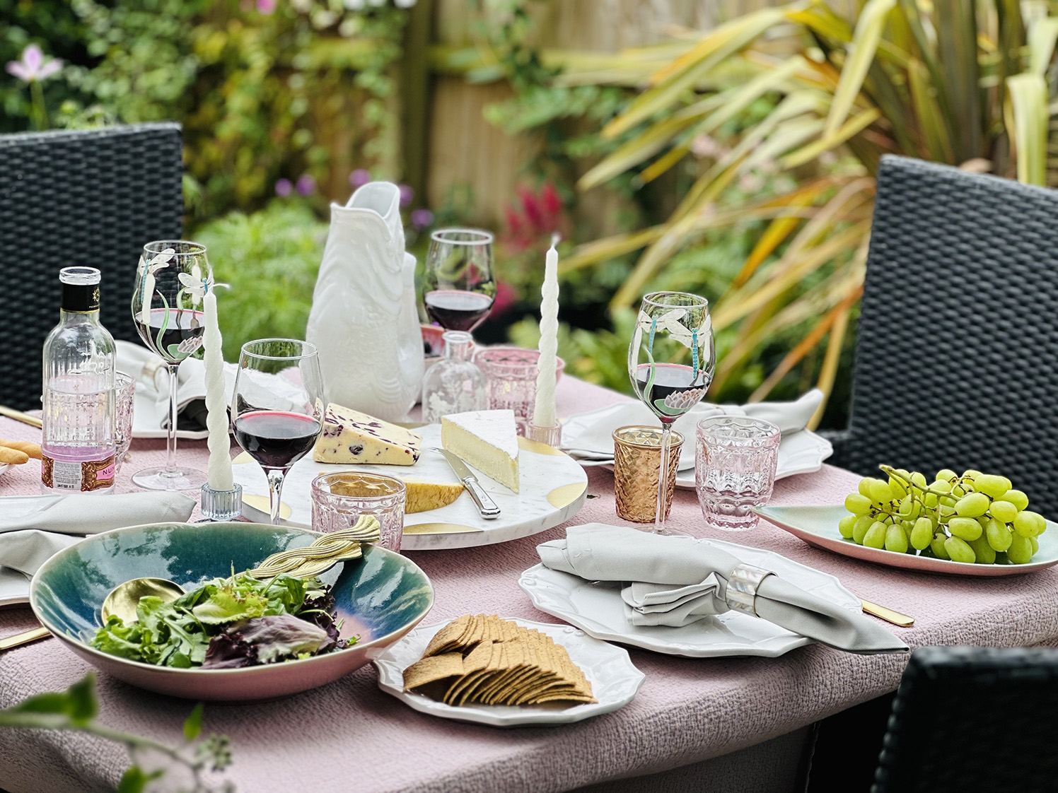 Cheese and wine tablescape designed by Emma Green for outdoor dining